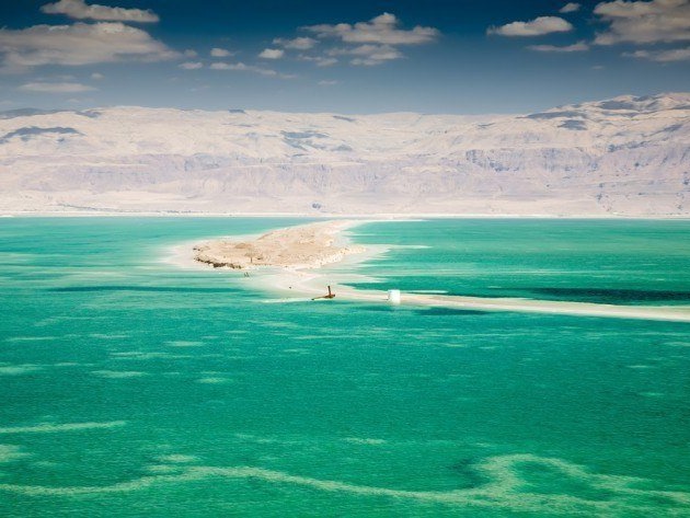 The lowest point on earth borders Israel and Jordan and allows you to experience a natural phenomenon -- floating weightlessly. It's best experienced ...
