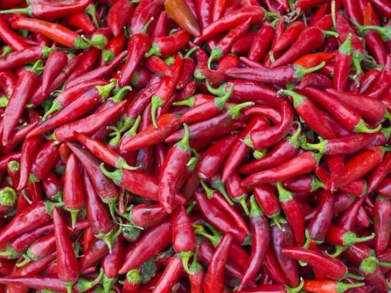 Spicy food warms you up, gets your heart pumping, stimulates nerve endings and increases the blood flow, so there might be some truth to this one. Jus...