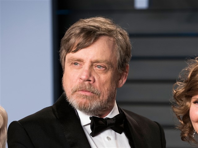 Mark Hamill held his hands in the air and mimed holding an Oscar.