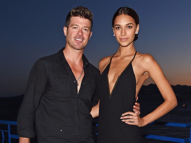 How stunning does April Love looks pregnant? Robin Thicke and April Love are expecting their first child together. The couple took to social media to ...