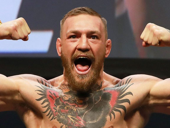 Conor Anthony McGregor (Irish: Conchúr Antóin Mac Gréagóir;[9] born 14 July 1988) is an Irish professional mixed martial a...